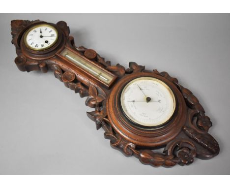 A Late Victorian Carved Oak Wheel Barometer, Clock and Thermometer. Foliate Decoration, 67cm High&nbsp;
