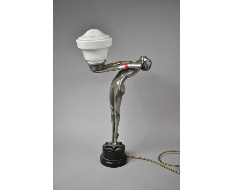 A Reproduction Art Deco Style Table Lamp in the Form of Standing Nude Supporting Shade in Outstretched Position, 69cm High Ma