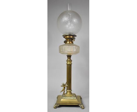 An Unusual Late Victorian Brass Oil Lamp having reeded Corinthian Column Support About to be Climbed by Winged Cherub. Square