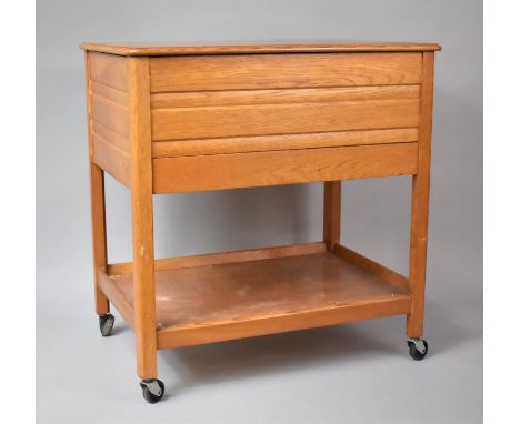 A Mid 20th Century Lift Top Sewing Trolley with Stretcher Shelf, 57cm wide 
