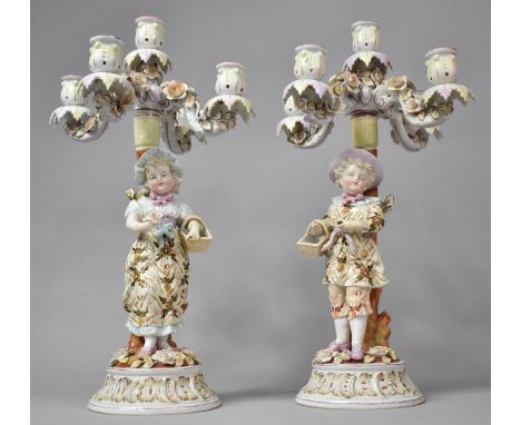 A Pair of 19th Century Continental, Possibly Sitzendorf Porcelain Five Branch Candelabra, Modelled as Young Boy and Girl with