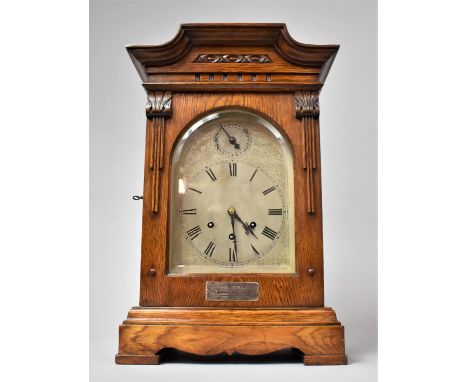 An Edwardian Oak Cased Bracket CLock with Silvered Dial and Gustav Becker Westminster Chime Movement. Silver Presentation Pla