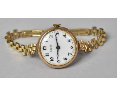 A 1930s 9ct Gold Rolex Wrist Watch, White Enamel Dial with Arabic Black Enamelled Numerals and Having Blue Hour and Minute In