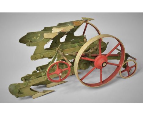 A Large and Detailed Scratch Built Metal Model of a Three Furrow Reversible Plough, 52cms Long.&nbsp;Hub Needs Attention.