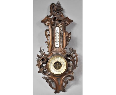 A French Art Nouveau Wall Hanging Carved Wooden Aneroid Barometer, The Dial Inscribed for Haussy and Badet, Lille, with Therm