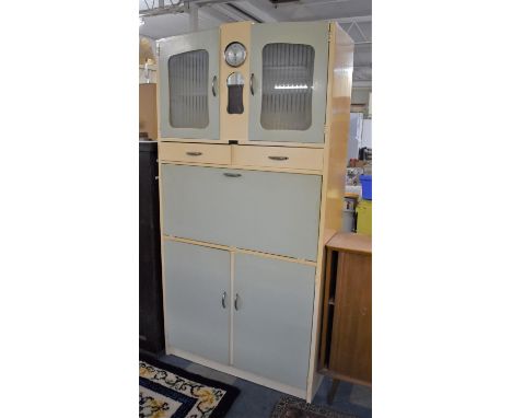 A 1950's Kitchen Cabinet with Inset Smiths Clock, 92cm wide 