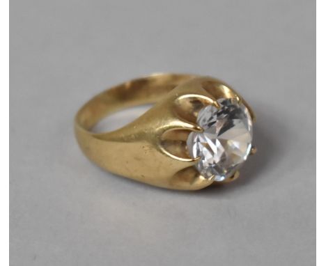 A Large and Impressive 9ct Gold Gypsy Solitaire Ring having Large White Stone (Tests as Sapphire) Mounted amongs Eight Claws.