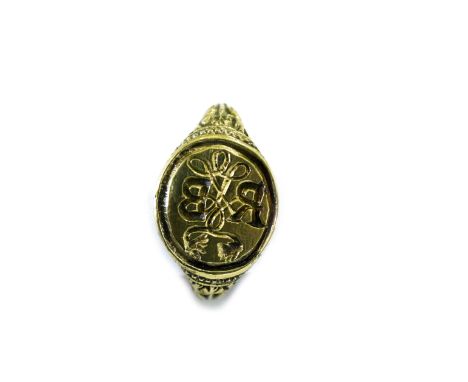 A POST MEDIEVAL GOLD FINGER RING WITH INITIALS R. B. An attractive Post Medieval Finger Ring, with reversed initials R B for 