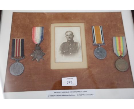 A MIDDLESEX REGT MM & TRIO-PHOTOGRAPH TO A CASUALTY. A Military Medal GV named to S/7292 L.Cpl F A Hodgkins 2/Middx R. A 1914