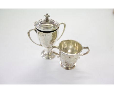 SILVER MILITARY CUPS. Including R A P C Int Coy Rifle Shooting Cup 1943-44. A lidded cup, The Kenya Police Golf Cup, hallmark