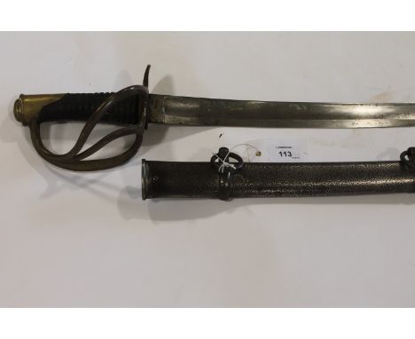 A FRENCH 19thC LIGHT CAVALRY SWORD & SCABBARD. An 1822 pattern French Light Cavalry Troopers sword with 36" curved single-edg