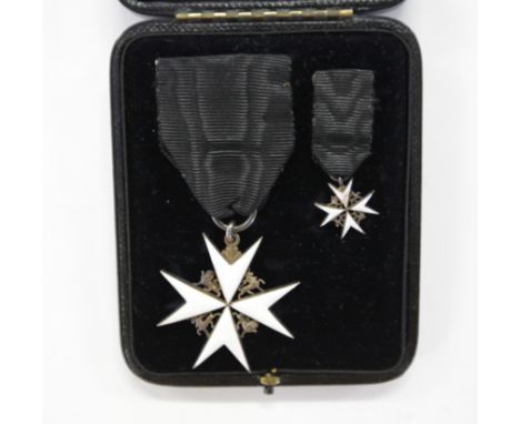 A ST JOHN OF JERUSALEM AWARD. A cased Officers Breast Medal of the Order of St John of Jerusalem, in silver and white enamel.