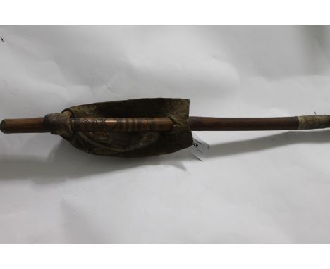 AN AFRICAN FIGHTING STICK. A Warriors fighting stick in the Zulu style, with partial snakeskin and carved decoration. A hide 