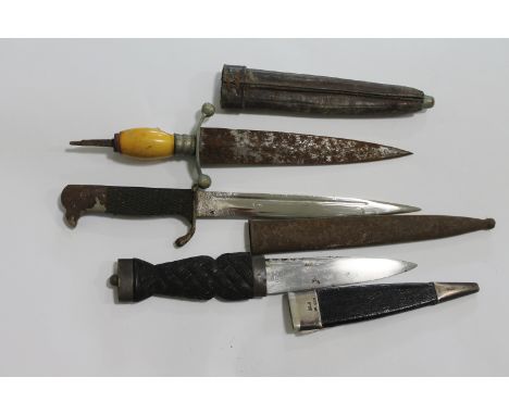 A SKEAN DHU etc. A stainless steel marked blade Skean Dhu with silver hallmarked mounts. Plain silver pommel with carved grip