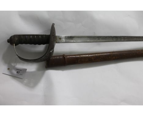 AN INFANTRY OFFICERS SWORD. An 1897 pattern GV period sword, complete with partial brown leather field scabbard (some loss to