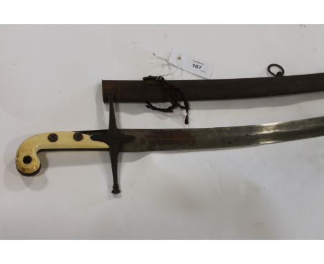 GENERAL C A WILDING CMG's MAMELUKE SWORD. A Mameluke sword with unusual curved double-edged blade of 31" length, having a rai