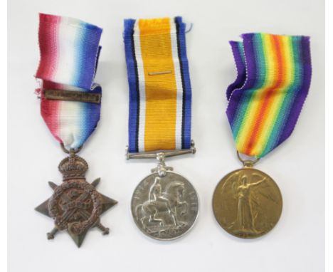 AN A K A RFA CASUALTY TRIO. A 1914 Star and Bar, named to 42799 Cpl G Palmer RFA. British War & Victory Medals named to 42799