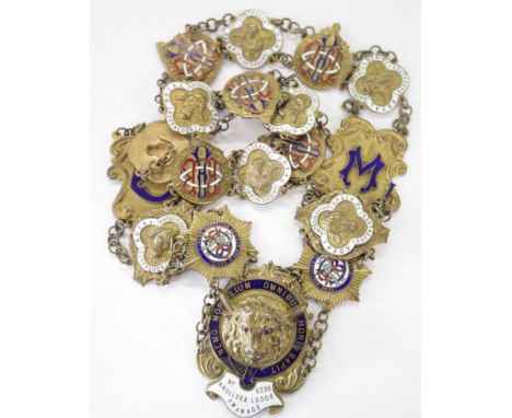 A MASONIC CHAIN KNOLLSEA LODGE, SWANAGE. A brass and enamel neck badge with red eyed buffalo head centre, above No 6296  Knol