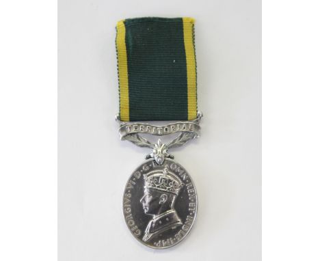 A TERRITORIAL EFFICIENCY MEDAL. A George 6th T E M named to 6141547 Sgmn F A Hastilow R Signals.