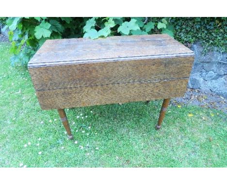 A 19th century oak rectangular drop leaf gate leg dining table, 56ins x 43.75ins x height 28.5ins