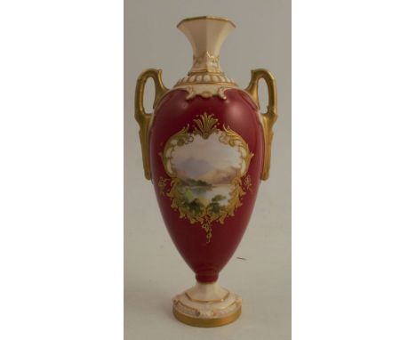 A Royal Worcester pedestal vase, the red ground body decorated with a landscape in a reserve to the front, shape number 2256,