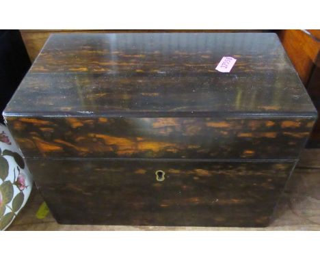 A 19th century coromandel tea caddy, of rectangular form, the interior fitted with two covered compartments, 9ins x 5ins, hei
