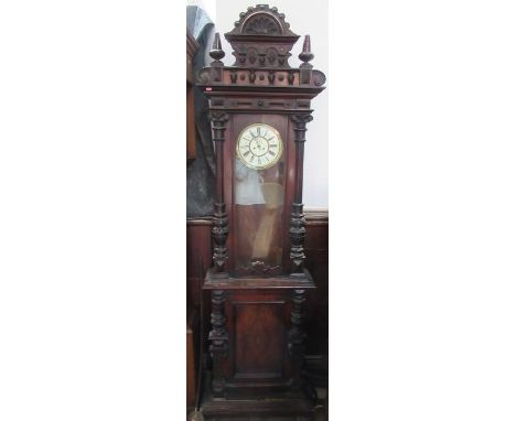 A 19th century mahogany cased regulator long case clock, with carved decoration, the base fitted with a cupboard door reveali