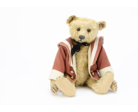 ’Percy’ an early Steiff teddy bear circa 1910, with blonde mohair, black boot button eyes, pronounced clipped muzzle, black s