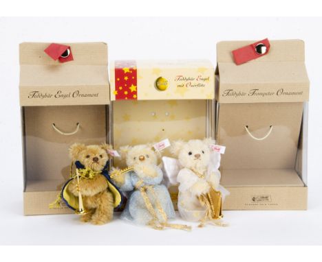 Three limited edition Christmas tree teddy bear ornaments: Teddy bear angel with transverse flute 1139 of 5000, 2004; Teddy b