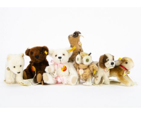Seven Historic Steiff Miniature animals and bears: including Uhu, Walrus, brown and white US Special teddy bears, all with ta
