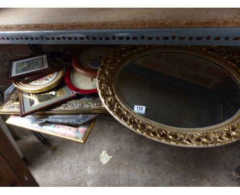 Shelf of mixed pictures and mirrors