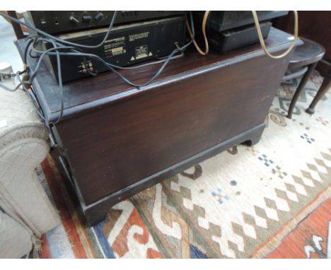 A vintage dark stained blanket box