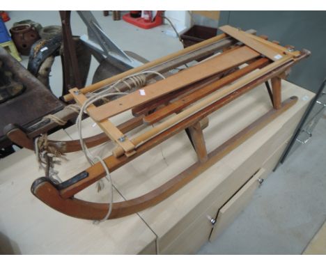 A vintage toboggan sledge