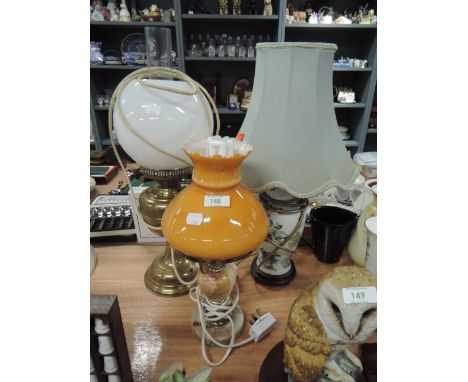 A selection of table top and side lamps including stone brass and ceramic