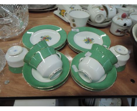 A selection of tea cups and saucers by Coalport