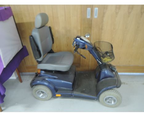 A mobility scooter, labelled Pride