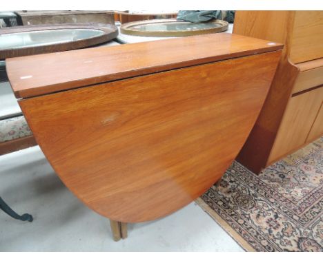 A vintage sapele drop leaf dining table