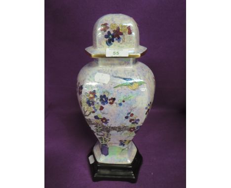 A hand painted ceramic lamp base