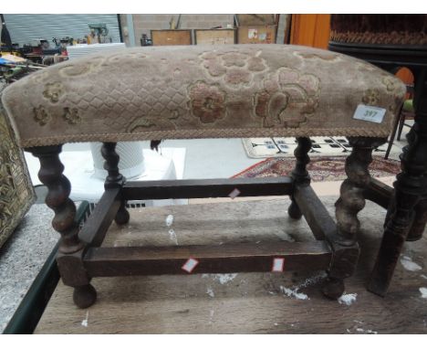 A vintage dressing table stool