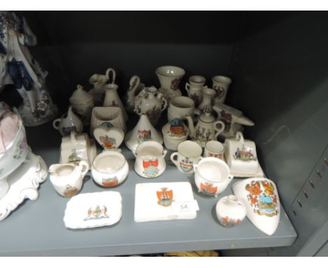 A selection of crested wares including Goss and Scottish thistle design