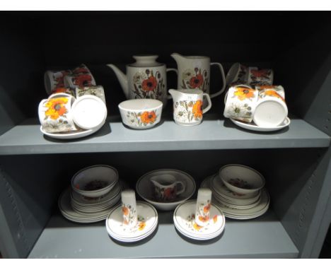 A Meakin Ironstone dinner/ tea service poppy decoration