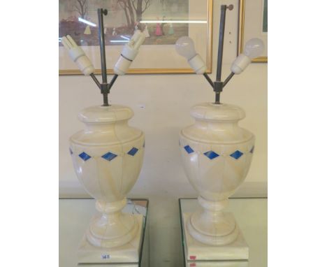 A pair of cream ceramic table lamps (2) Condition Report: Available upon request