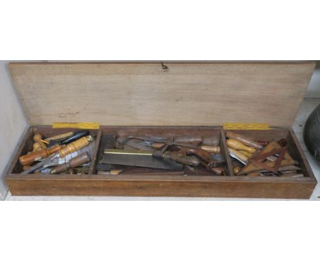A wooden box with carpenters tools, 9cm high x 83cm wide x 23cm deepThe estate of the late Robert and Lyndsay Brydon, Edinbur