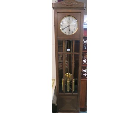 An Art Deco oak longcase clock 213cm high Condition Report: Available upon request