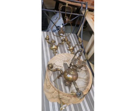 A brass three branch chandelier, pair of wall lights and a rise and fall light (4) Condition Report: Available upon request