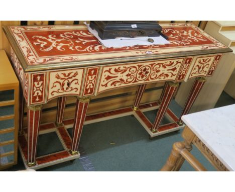 A highly ornate laminate console table with three drawers on column supports, .88cm high x 146cm x 45cm Condition Report: Ava