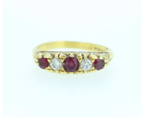 18ct gold ring set with two brilliant cut diamonds and three brilliant cut rubies, engraved mount, stamped 18ct, size P1/2, 5