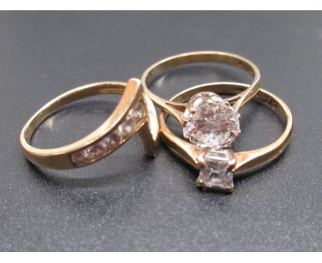 14ct yellow gold ring set with clear stones, size L, stamped 14k, a 9ct yellow gold solitaire ring set with clear stone, size