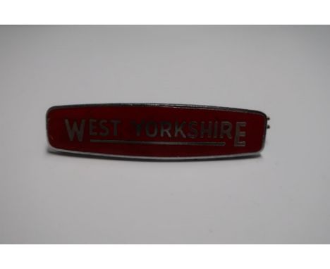 West Yorkshire red enamel cap badge 