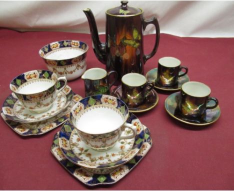 Wilkinson's Royal Staffordshire Pottery fifteen piece lustre ware coffee service decorated with butterflies, highlighted in g